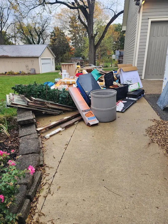 Dumpster being loaded with debris for Commercial Dumpster Rental in Aberdeen
